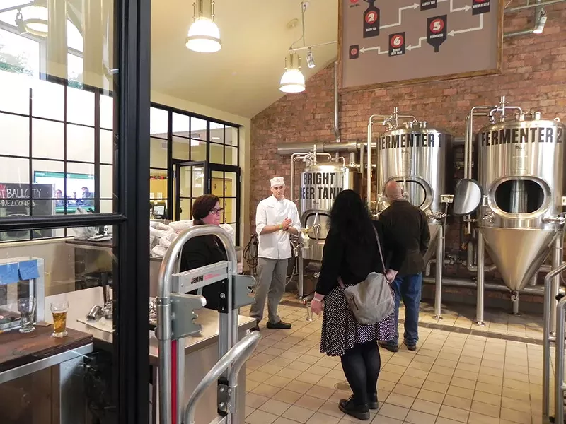 Brew U attendees tour the CIA's on-campus brewery.