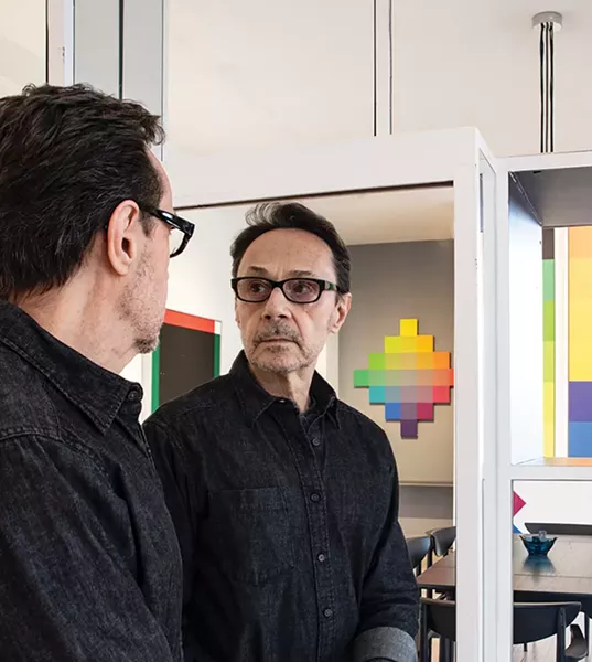 Rick Gillette in the gallery of his live/work loft. - DEBORAH DEGRAFFENREID
