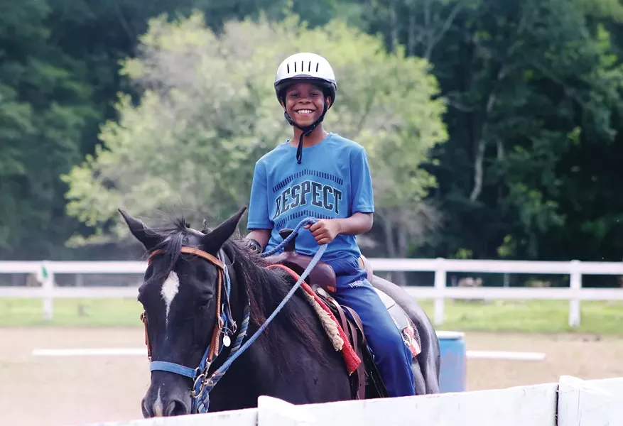 Horseback riding at the Frost Valley YMCA camp.