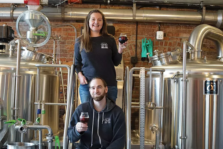 Cortlandt Toczylowski, owner and headbrewer, and Caroline Bergelin, owner, graphics and sales, at King’s Court Brewing Company. - PHOTO BY JOHN GARAY