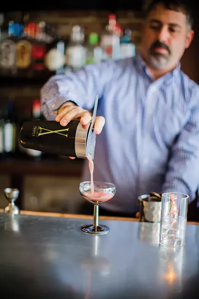 Head bartender David Garrett preparing a cocktail - PHOTOS BY MARY KELLY