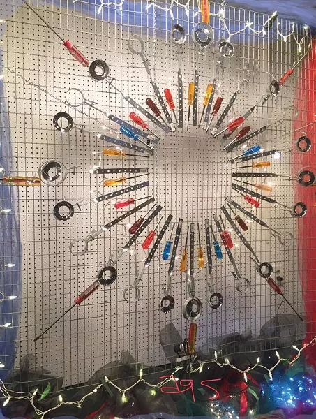 Smith Hardware 2018 holiday wiindow display art, Star Driver by Angela Gaffney-Smith.