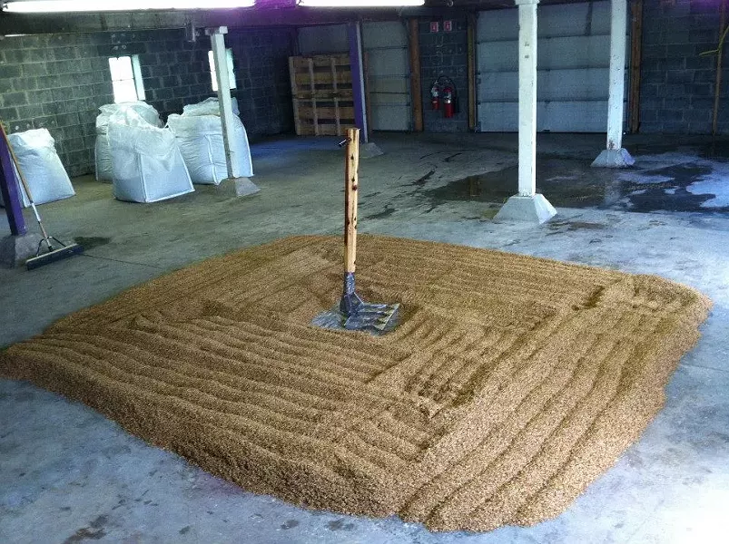Grains grown on-site are floor-malted. "When we started, no one was doing it around here," says Coppersea CEO Michale Kinstlick. - COPPERSEA DISTILLERY