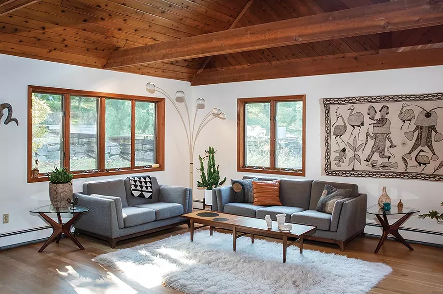 A corner of the home’s living room is devoted almost exclusively to Midcentury Modern design pieces. “We love that MCM is functional and practical, yet has a fun, playful side that inspires us to live better,” says Moser. “After World War II there was such hope for the future—new manufacturing techniques and materials like plywood, plexiglass, and plastic had been invented. Ambitious designers were eager to implement them into affordable furniture for the growing middle class.” - PHOTO: DEBORAH DEGRAFFENREID