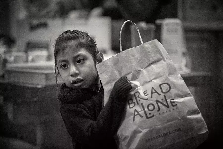Every third Thursday Holy Cross/Santa Cruz Episcopal Church in Kingston hosts a food and clothing giveaway for asylum seekers and their families. - PHOTO: DAVID MCINTYRE