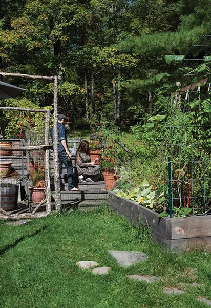 Hammer and Lafferty have been industriously building their extensive outdoor garden. Along with the original perennial garden, they’ve planted a pollinator garden to attract hummingbirds and monarch butterflies, and incorporated native plants from Catskill Native Nursery and Adams Fairacre Farms into the landscaping in multiple terra cotta pots and barrels. They also constructed a cedar trunk deer fence with an arched planted trellis at the entrance. - PHOTO: DEBORAH DEGRAFFENREID
