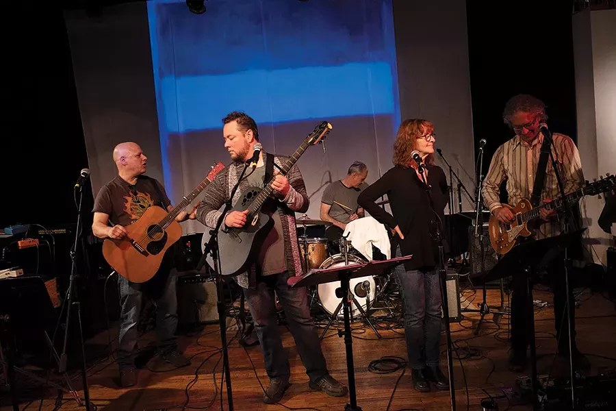 Danny Blume, Joey Eppard, Jeff Mercel, Leslie Ritter, and Adam Widoff tuning up at the Falcon for an Abbey Road tribute show.