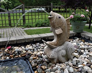 The soothing sounds of the fish fountain permeate  St. Gregory’s Horticultural Therapy Garden.