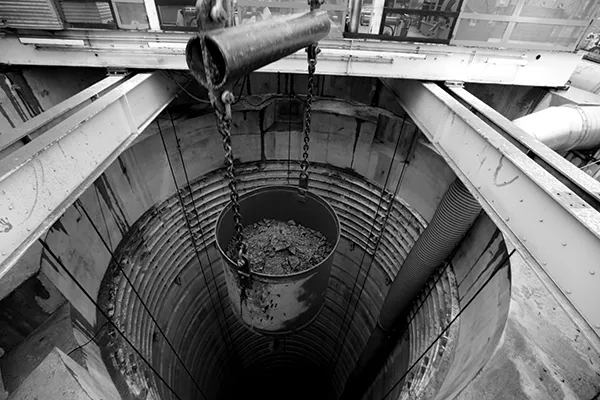 As Shaft 6B in Wappinger is excavated, blasted rock is loaded into buckets and hauled to the top.