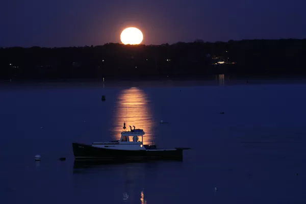 Monday’s Full Moon in Taurus, over Casco Bay, Maine. Photo by Amanda Painter.