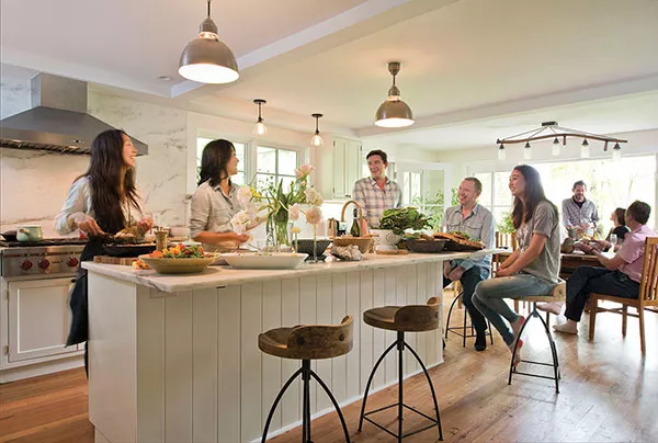 Betty Choi, chef Doris Choi, Niall Grant, Craig Leonard (from left to right) in the kitchen. (Daughter Maia, seated with them at the island, and their guests will soon enjoy the lunch being prepared.) The Choi sisters have always had strong ties to food and family. Their journey—both to Woodstock and to a better understanding of nutrition—has changed all of their lives. "Our awareness of food and our relationship to it is now a daily focal point in the way we live," says Leonard. - DEBORAH DEGRAFFENREID