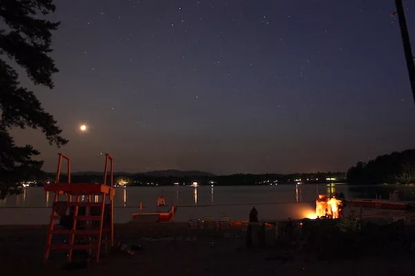 Crescent Moon and fire on the beach at Dance New England last week, Freedom, New Hampshire. - AMANDA PAINTER