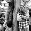 Hoppy Quick poses with a bear sculpture. Hoppy Quick poses with a bear sculpture.