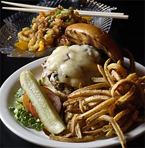 A juicy burger, fresh-cut fries, and tender calamari, washed down with a cold Pabst. - WALTER NOVAK