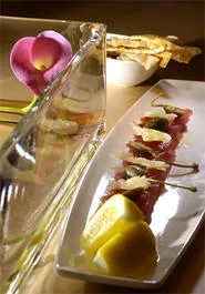 Ahi tuna-lovers will rejoice over Bruell's tuna carpaccio. - WALTER NOVAK