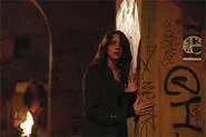 Asia Argento reads the writing on the wall in Mother of Tears.