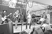 Ask guitarist Sylvain Sylvain (second from left) the - cause of the New York Dolls' demise, and you'll get a - straight answer: "It was heroin."