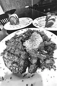 Atkins freaks can order the Delmonico steak and - shrimp. - WALTER NOVAK
