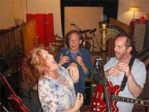 Baby Dee shows off new dental work to her indie-rock friends.
