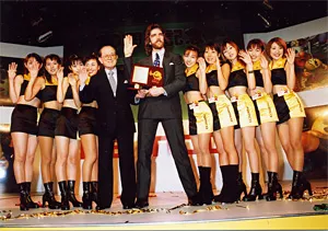 Billy Mitchell: Living the dream, complete with Pac-Man Girls.
