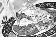 Blue-cheese-encrusted strip steak: Sexy as hell. - WALTER NOVAK