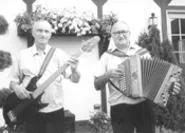 Blue suede lederhosen: Spetich and Stash Franjic - (left) rip through some mean Alsatian riffs. - COURTESY OF BETTY SPETICH