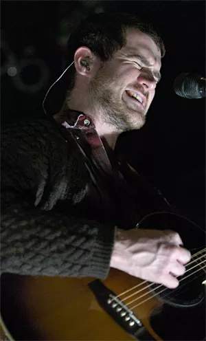 Brand New's Jesse Lacey makes a major guitar face at House of Blues. - WALTER NOVAK