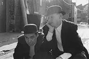 Bums on the run: Godot's Michael Regnier (left) and Larry Nehring.