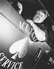 Cabbie Chris Christman, working the Flats on a recent Saturday. - WALTER NOVAK