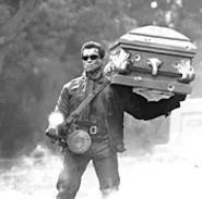 Casket curls: Arnold takes a stroll through - post-industrial nihilism.