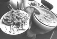 Charming Barons, where balanced meals are those - that don't fall from the server's tray. - WALTER NOVAK