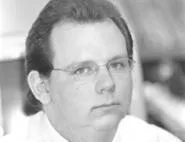Chris Wetterich anticipates a spring rain of attention - on his paper's actions. - WALTER NOVAK
