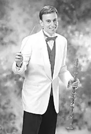 Conductor Carl Topilow prepares for his big night with - the Cleveland Pops Orchestra on Friday.