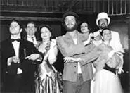 Dan Folino (center) as Che Guevara, with Evita cast members.