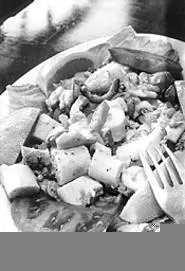 Dig in! Octopus Salad With Plantains and Garlic Sauce. - WALTER NOVAK