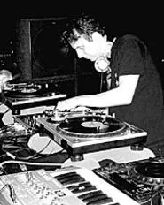 DJ TLR mans the tables at Bunker Records-Crme - Organization's Winter Tour.