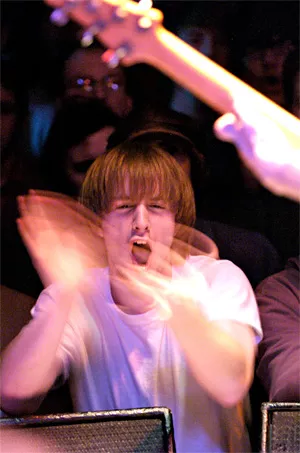 Explosions in the Sky fan shows some love at the Beachland. - WALTER NOVAK