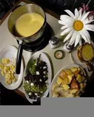 Feeling cheesy? Le Oui Oui's fondue dinners can help. - WALTER NOVAK