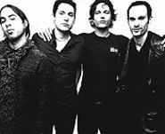 Four white guys (Jenkins, second from left) who play rock music. Scared yet?