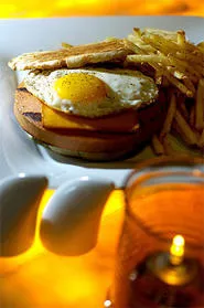Fried bologna becomes haute cuisine at Michael Symon's Lola. - PHOTO BY WALTER NOVAK