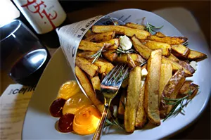 Fries of the gods: Bar Cento's crunchy, rosemary-scented Pommes Frites. - WALTER NOVAK