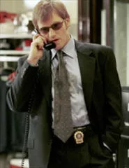 Get a Job: Denis Leary plays Mike McNeil, a - cop with a mint tin full of pills, a stomach full of - Scotch, and a bed full of mistress.