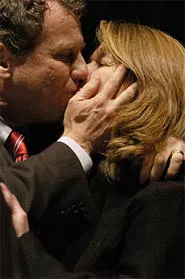 Get a room: Arm candy Sherrod Brown makes out with his wife, Connie Schultz.