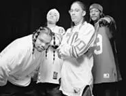 Get Bizzy! The non-incarcerated Bone Thugs (Bizzy, - second from left) in happier times.