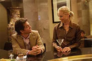 Hugh Dancy and Maria Bello have a robust discussion about Pride and Prejudice with their eyes.