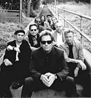 It's hip to be on stairs: Huey Lewis & the News are at - Scene Pavilion on Sunday.