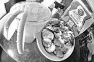 Jerk chicken and stir-fried rice: What margaritas were - made for. - WALTER NOVAK