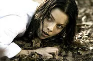 Lauren German tries to avoid implements of torture.