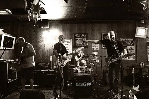 Local classic rock cover band Alter Ego perform at 69 Taps in Medina on August 31, 2013. The bar and its former management are being sued for copyright violation for having the performance and not paying licensing fees