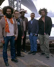 Lovers before the war: TV on the Radio and Adebimpe (center).